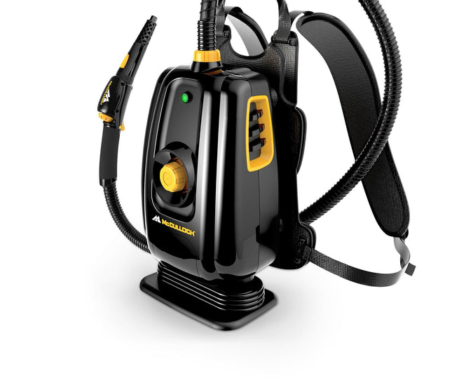 MC1350 Portable Power Steam Cleaner with back straps, front facing product black and yellow with heat indicator light and water tank cap, hose and nozzle attachment