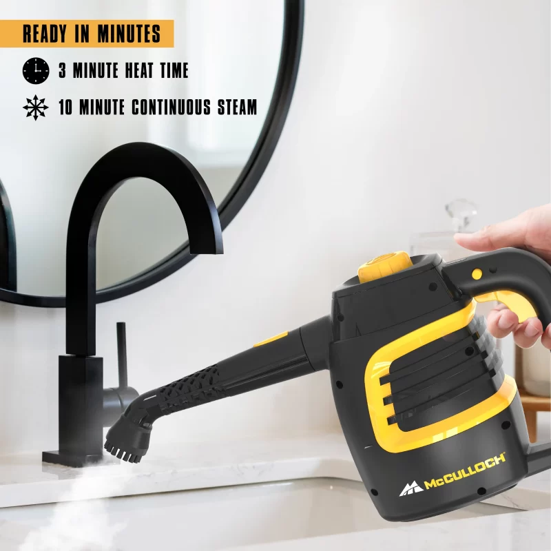 Lifestyle image of a MC1230 heavy duty Handheld Steam cleaner cleaning a sink. There is black text and supporting black icons that says: Ready in minutes, 3 Minute heat time, and 10 minute continuous steam